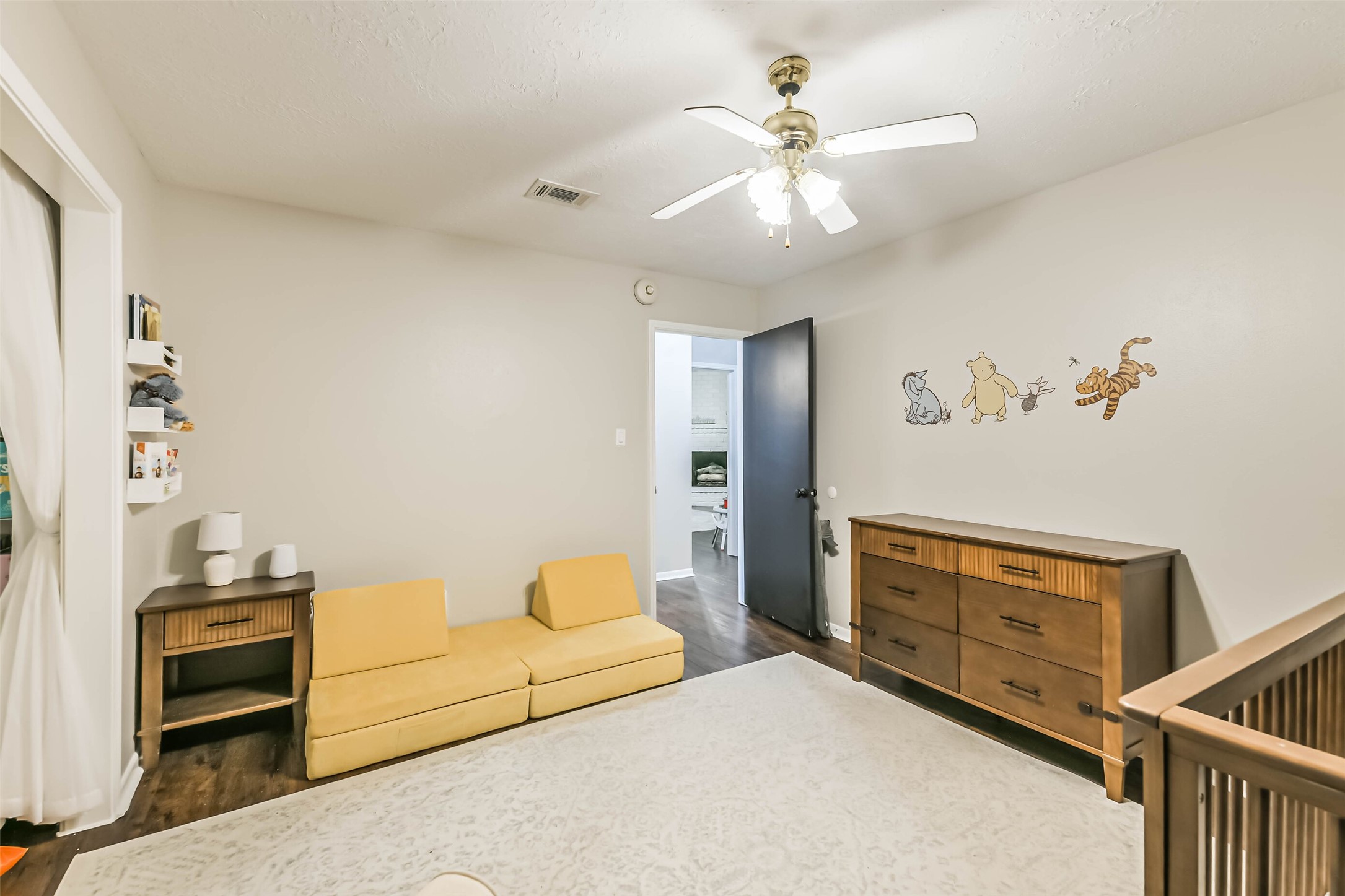 29319 Binefield Street Spring, TX 77386 - Photo 24 of 32 a bedroom with a bed and cabinets