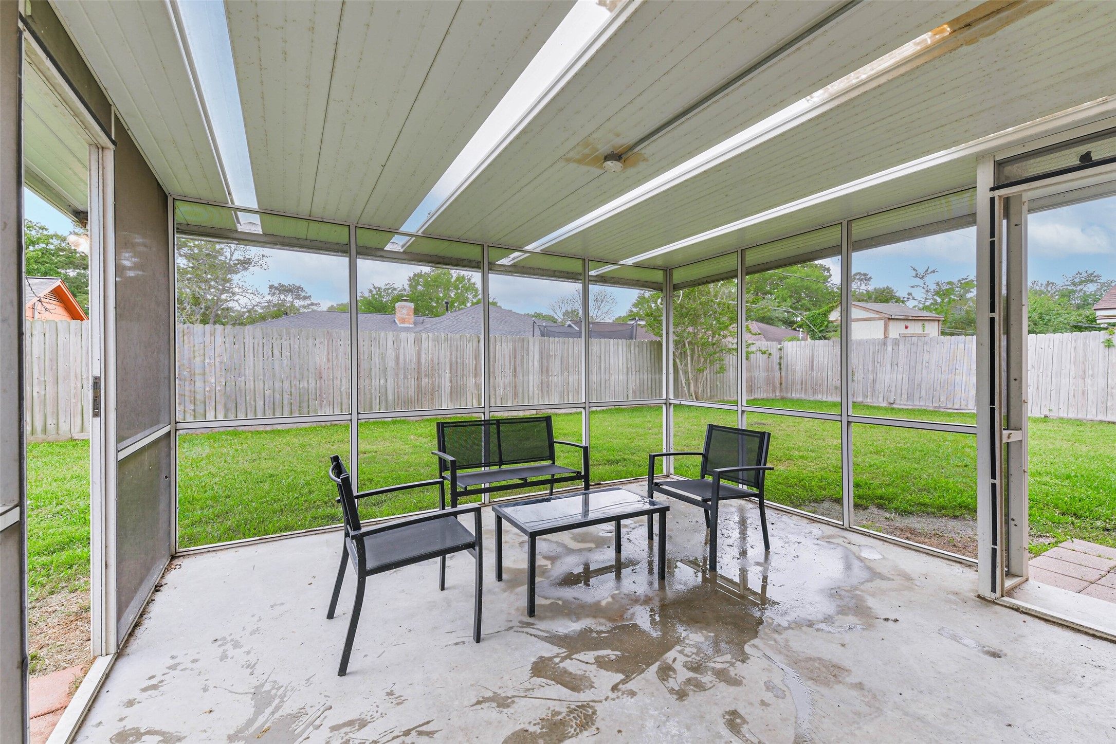 29319 Binefield Street Spring, TX 77386 - Photo 29 of 32 a view of a back yard with a table and chairs
