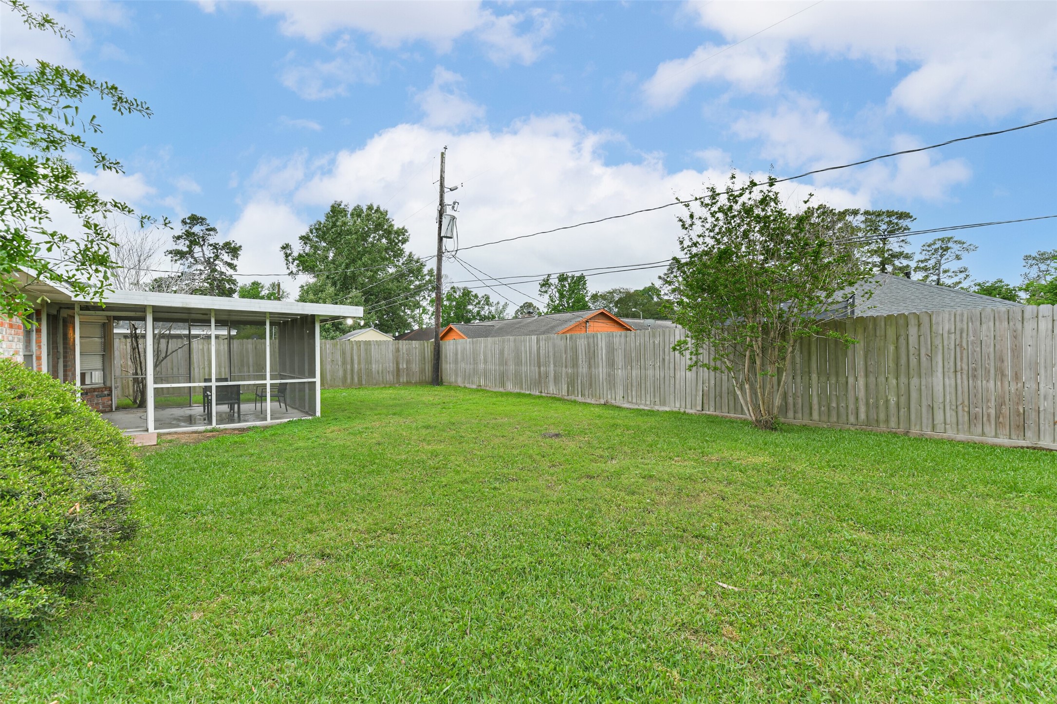 29319 Binefield Street Spring, TX 77386 - Photo 32 of 32 a view of a backyard with a garden