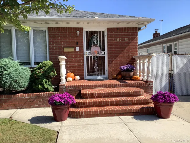 a front view of a house having patio