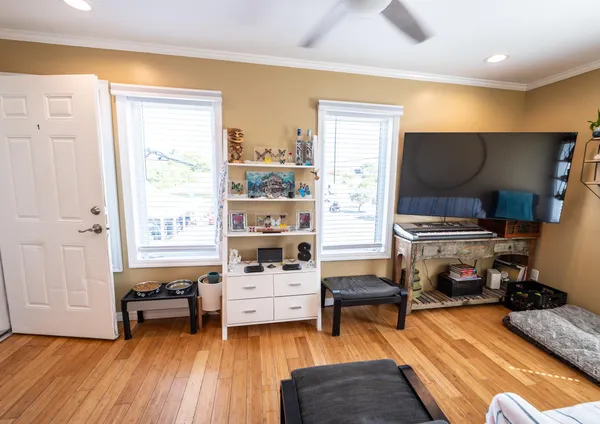 a bedroom with a bed and a dresser