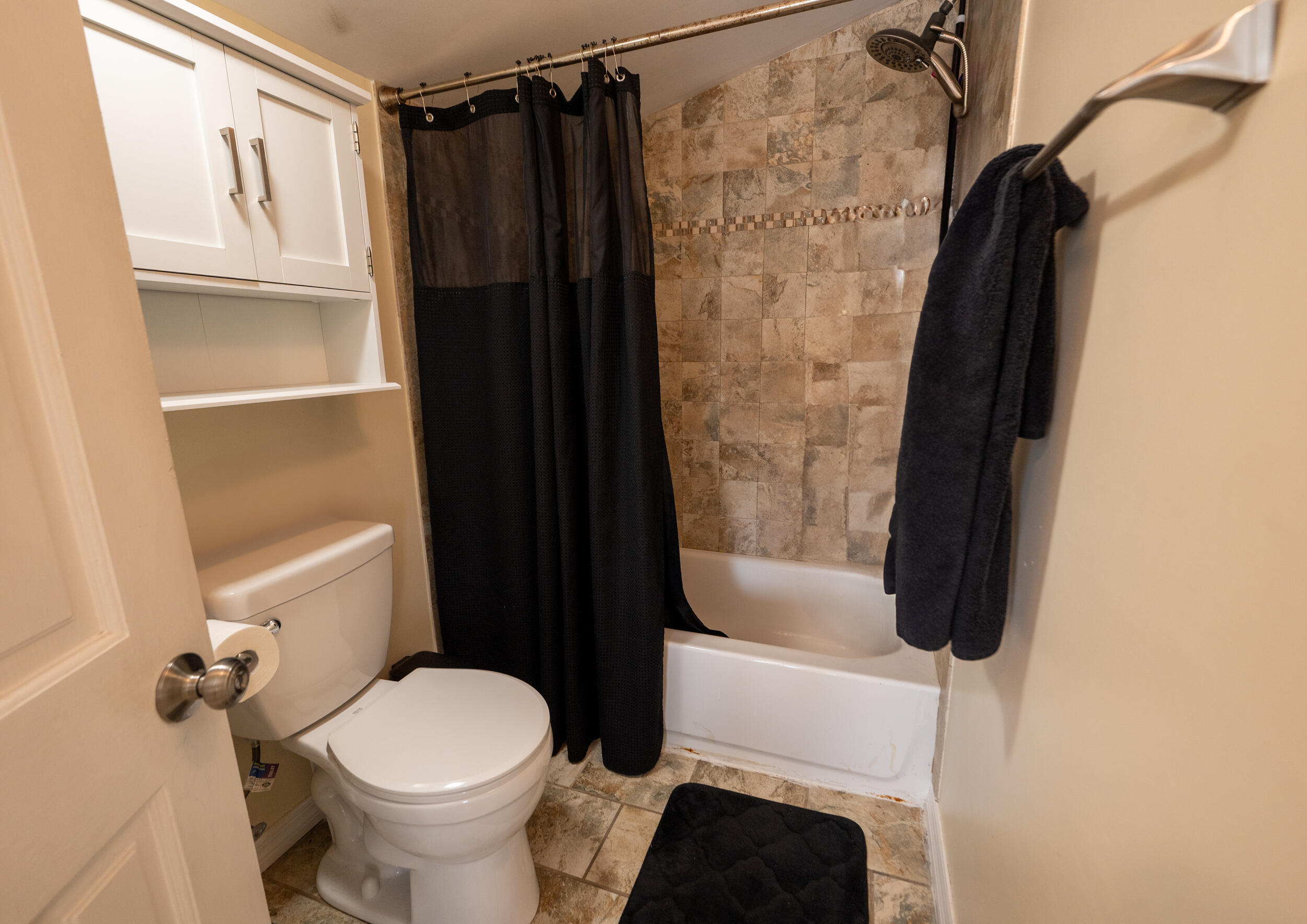 1124 Catherine Street, Unit 201 Key West, FL 33040 - Photo 12 of 21 a bathroom with a toilet and a shower