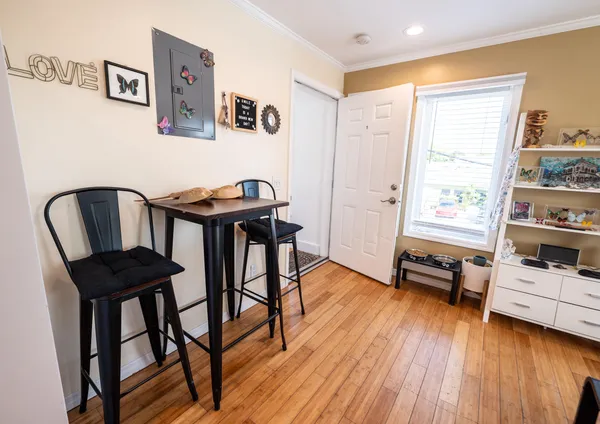 a bedroom with a bed and a television