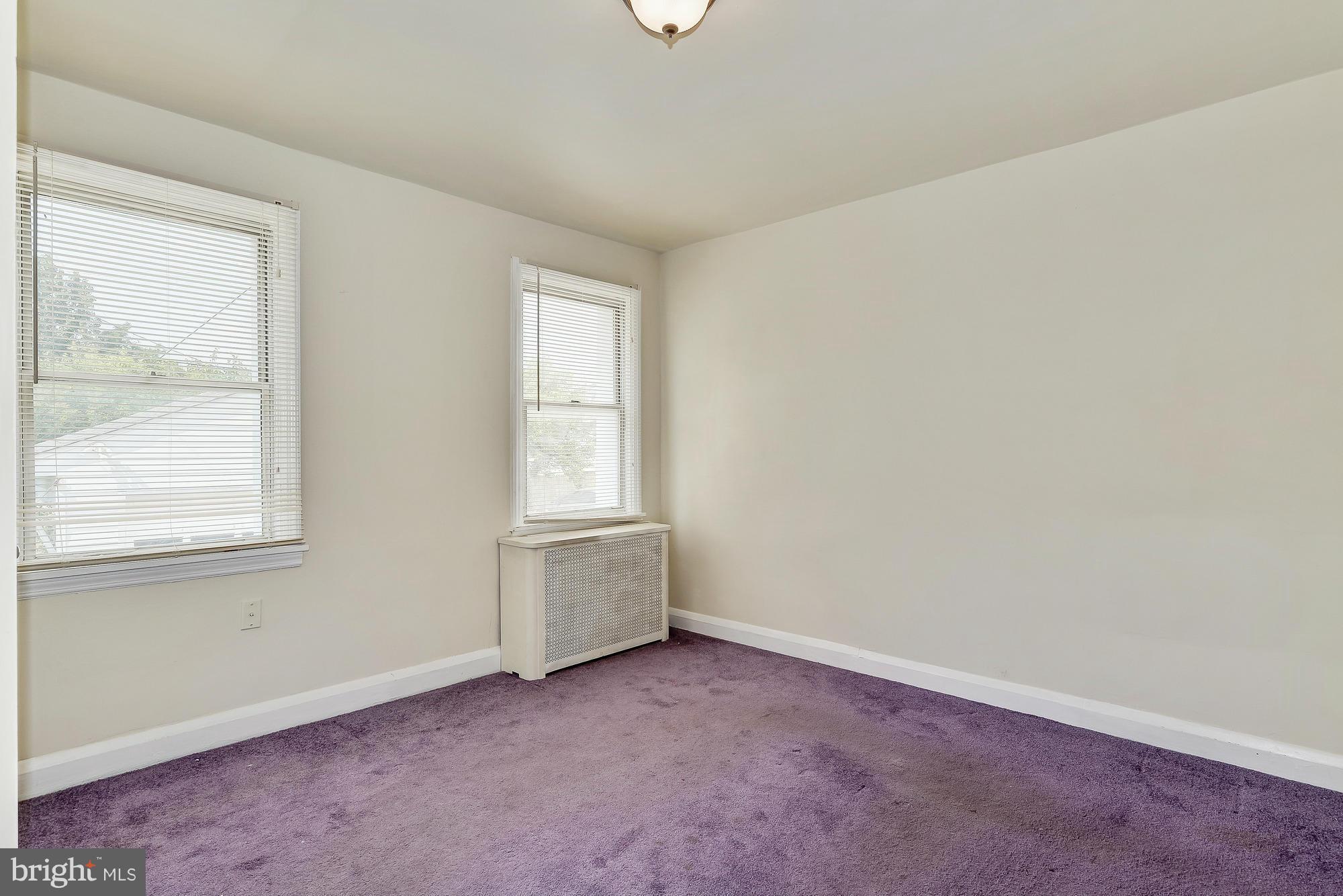 7925 Liberty Road Baltimore, MD 21244 - Photo 17 of 30 an empty room with windows