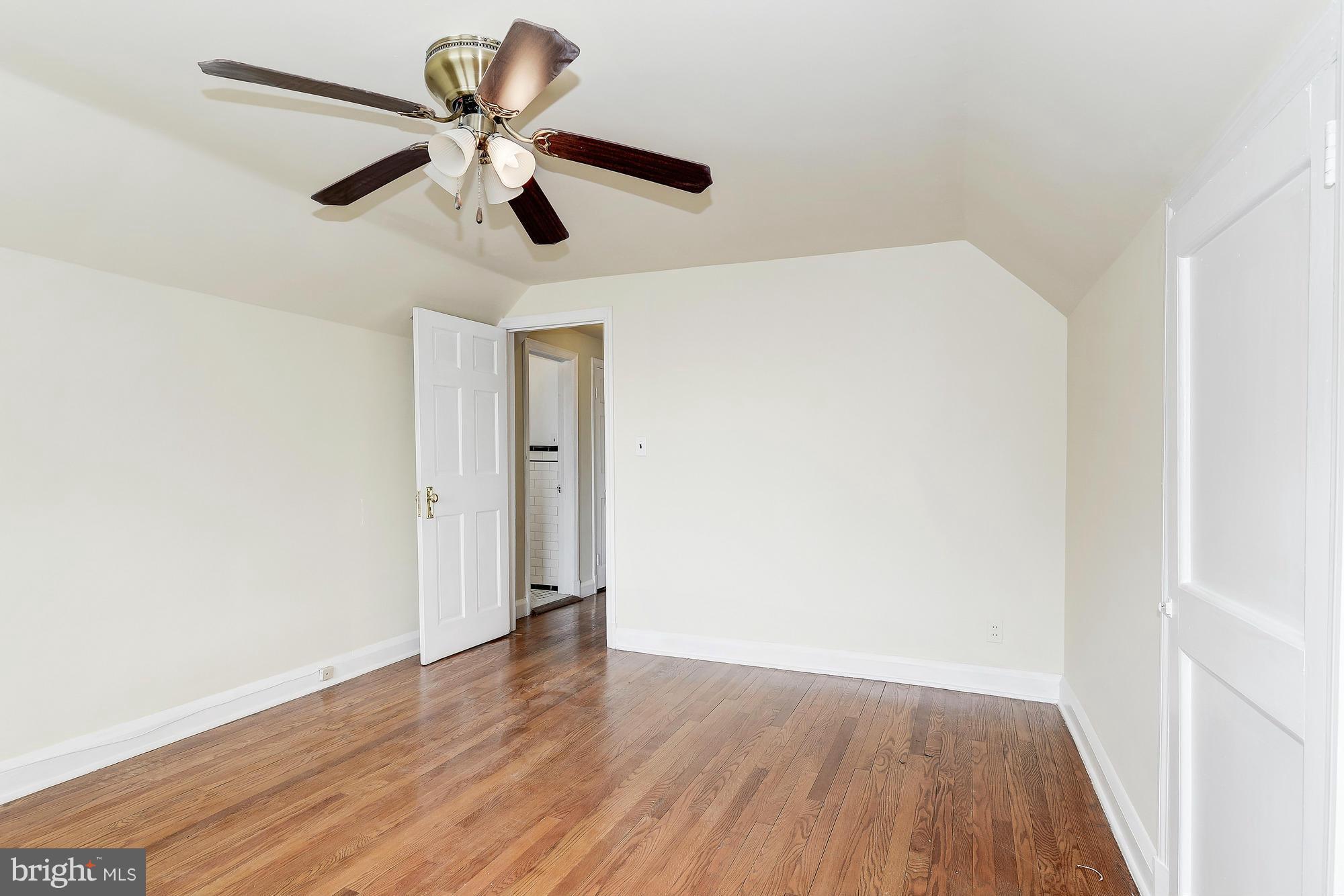 7925 Liberty Road Baltimore, MD 21244 - Photo 21 of 30 a view of room with wooden floor