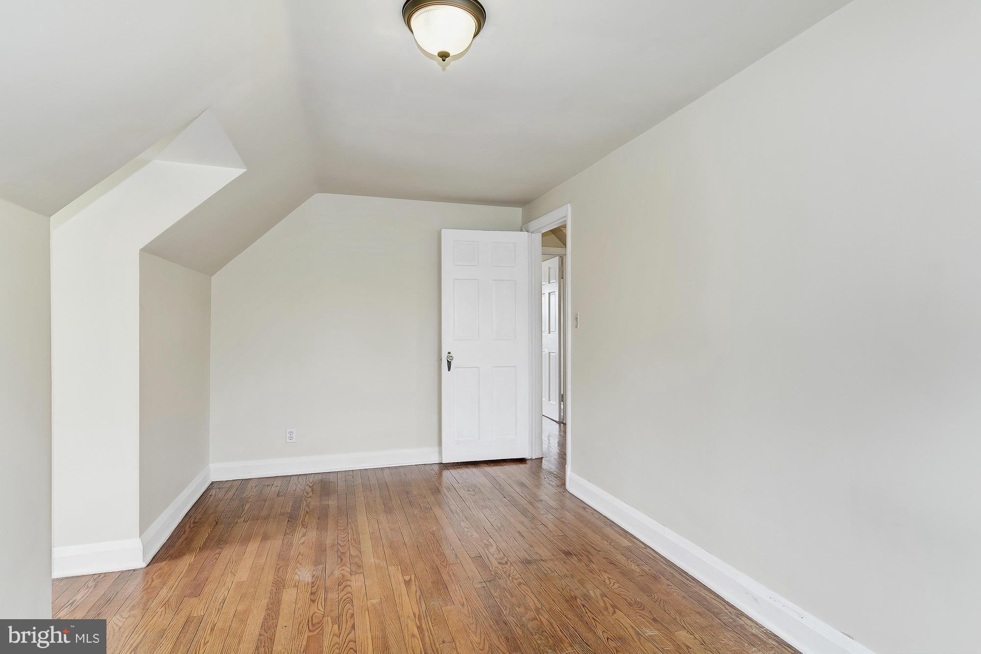 7925 Liberty Road Baltimore, MD 21244 - Photo 24 of 30 a view of a room with wooden floor