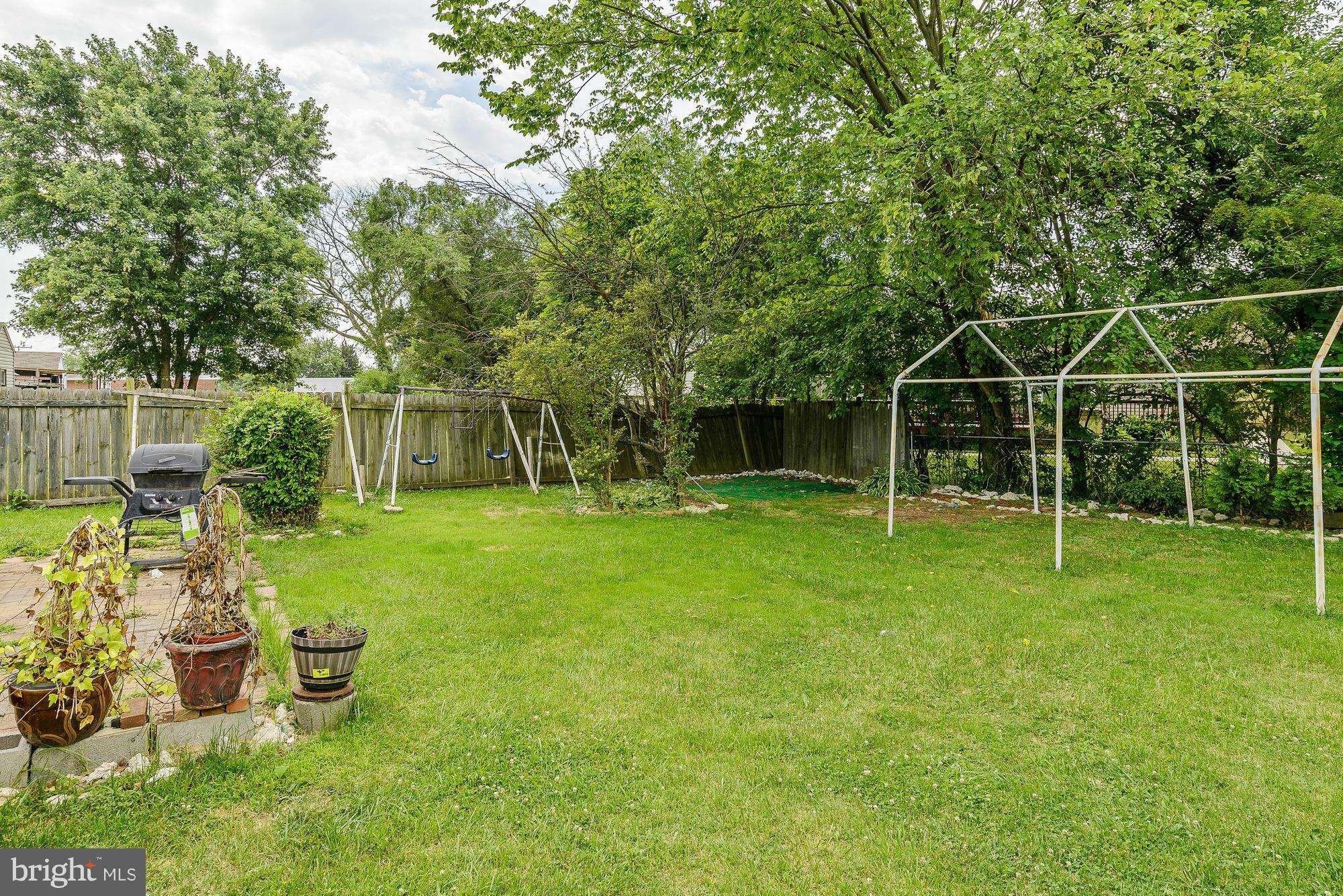 7925 Liberty Road Baltimore, MD 21244 - Photo 29 of 30 a view of a chair and table in the garden