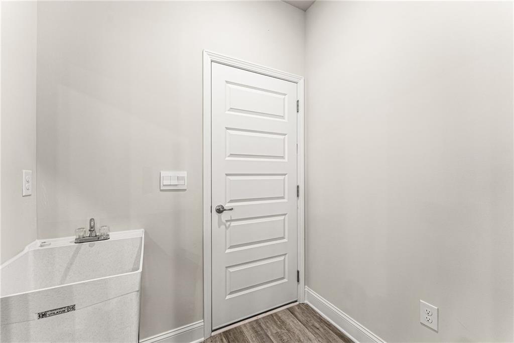 662 Forest Way Cornelia, GA 30531 - Photo 18 of 54 a view of walk in closet with empty racks