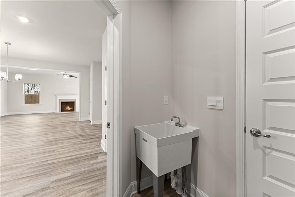 662 Forest Way Cornelia, GA 30531 - Photo 19 of 54 a bathroom with a sink and mirror