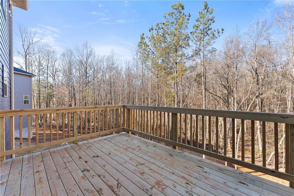 662 Forest Way Cornelia, GA 30531 - Photo 20 of 54 a view of balcony with wooden floor