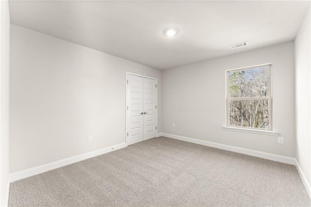 662 Forest Way Cornelia, GA 30531 - Photo 28 of 54 an empty room with a window