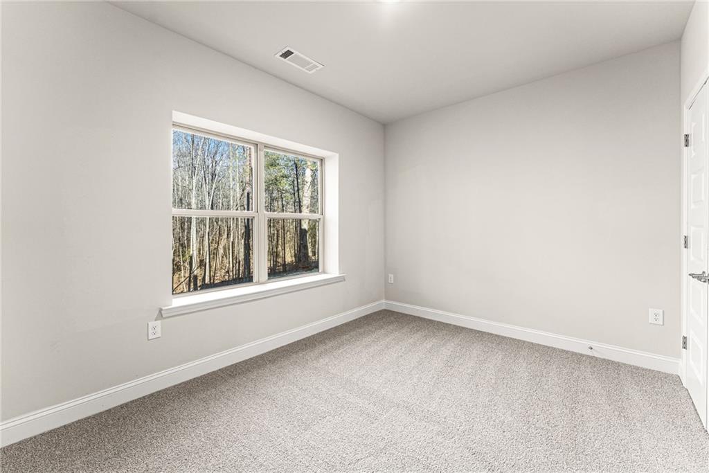 662 Forest Way Cornelia, GA 30531 - Photo 40 of 54 an empty room with a window