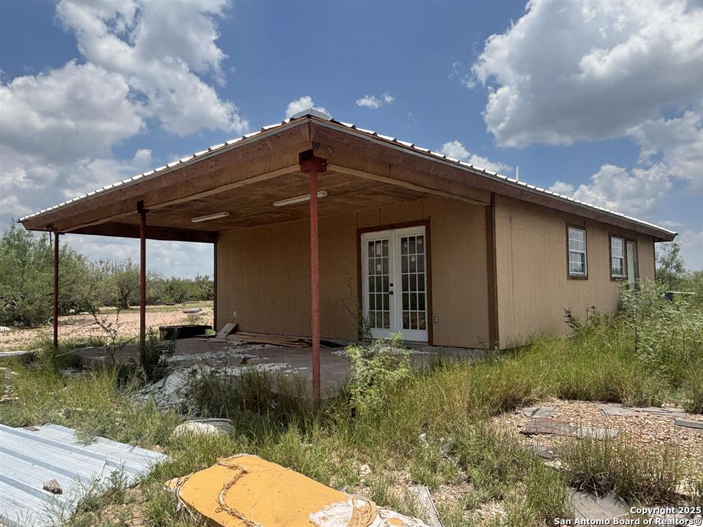 446 Ranch Road Laredo, TX 78043 - Photo 3 of 10 a backyard of a house with yard barbeque oven and outdoor seating