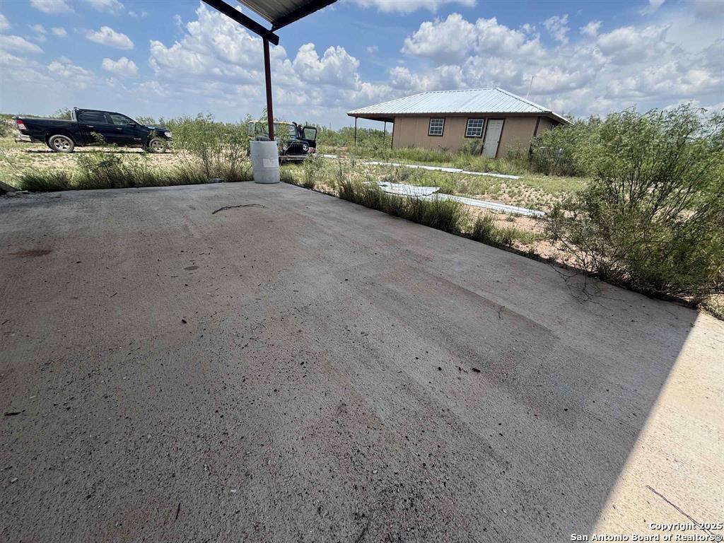 446 Ranch Road Laredo, TX 78043 - Photo 9 of 10 a front view of a house with a yard and garage