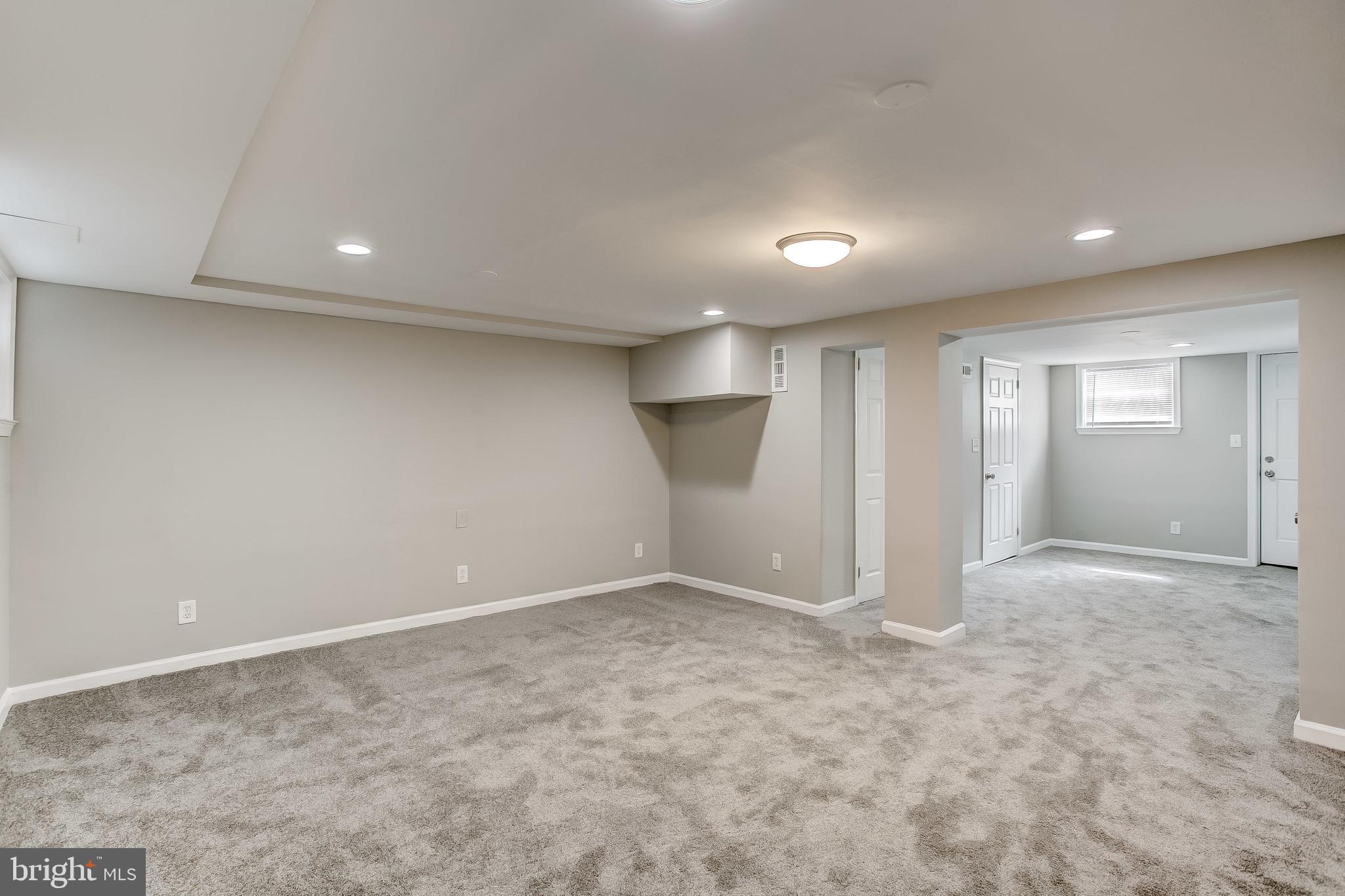 1625 Northwick Road Baltimore, MD 21218 - Photo 26 of 33 This room goes the entire length of the house