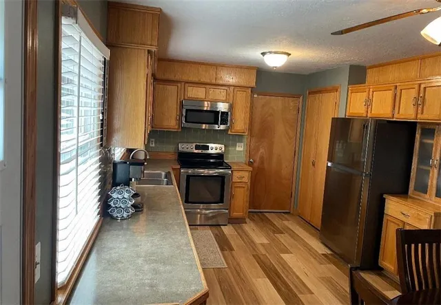 $275,000 | 102 Southwest Moore Court, Blue Springs, MO 64014