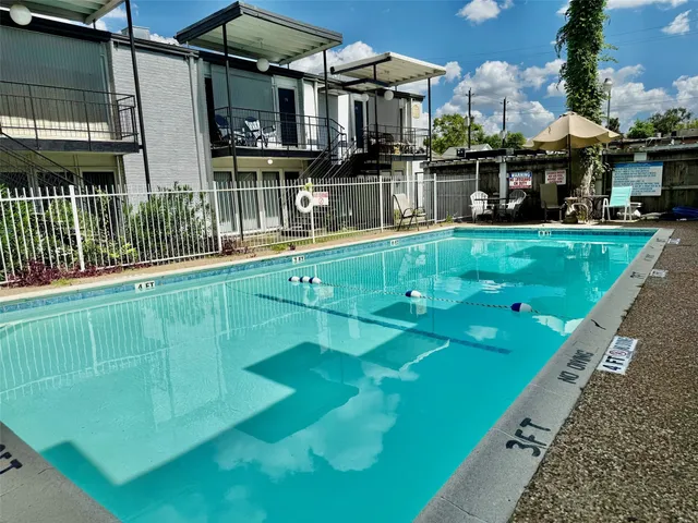 a view of a house with swimming pool