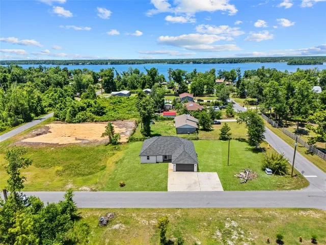 a house with yard in front of it