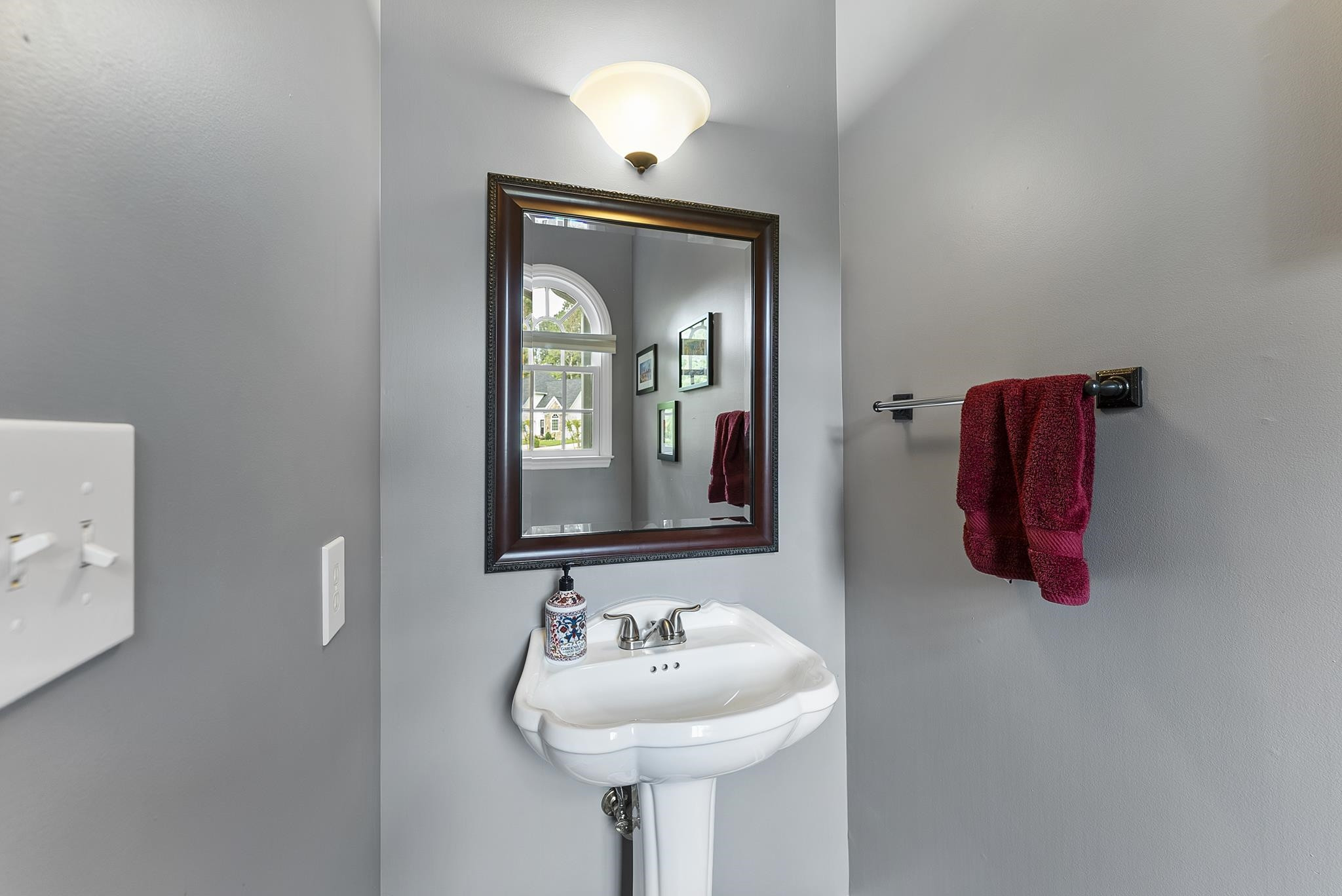 15 Otters Run Durham, NC 27712 - Photo 14 of 46 a bathroom with a sink and a mirror