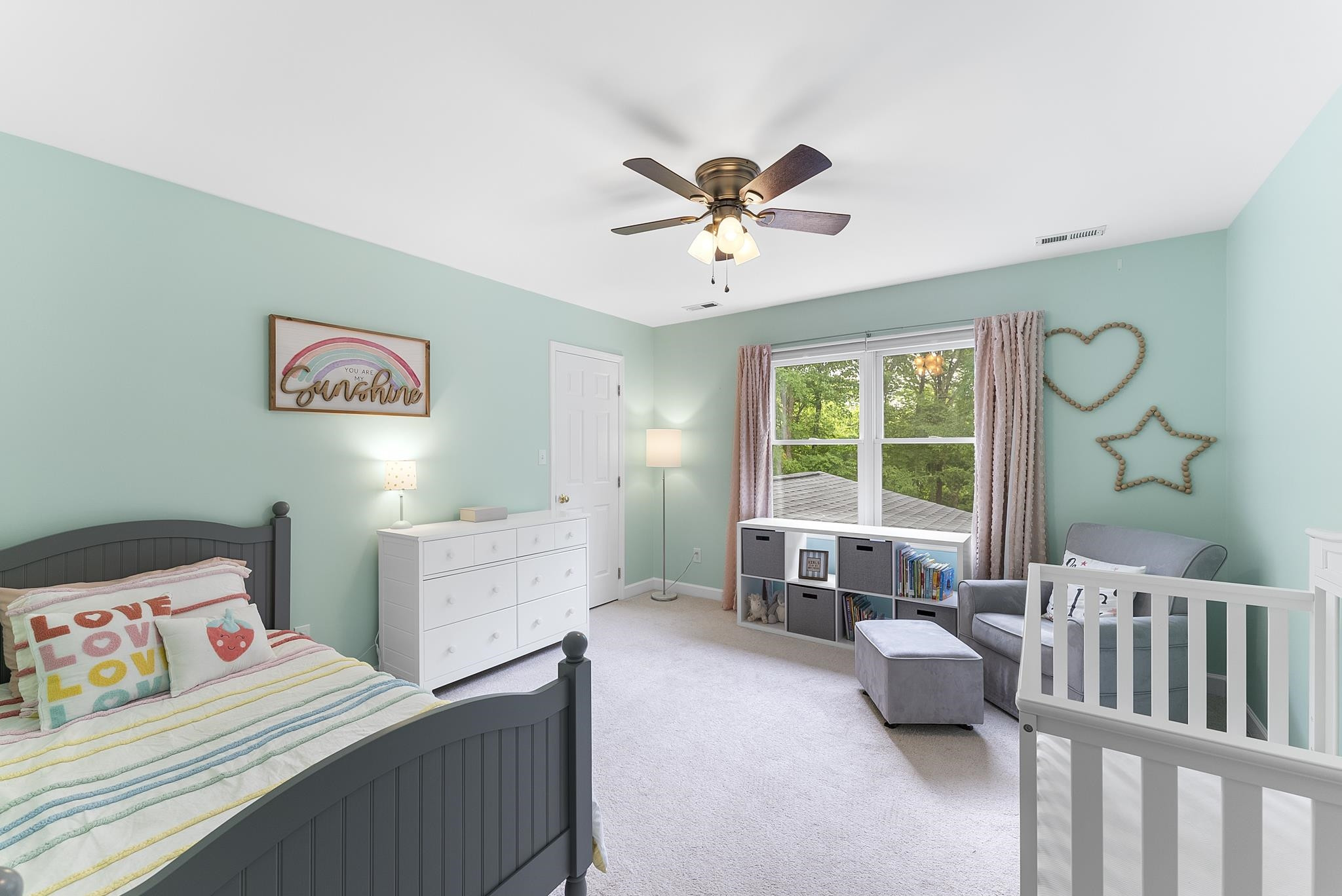 15 Otters Run Durham, NC 27712 - Photo 24 of 46 a bedroom with furniture and a large window