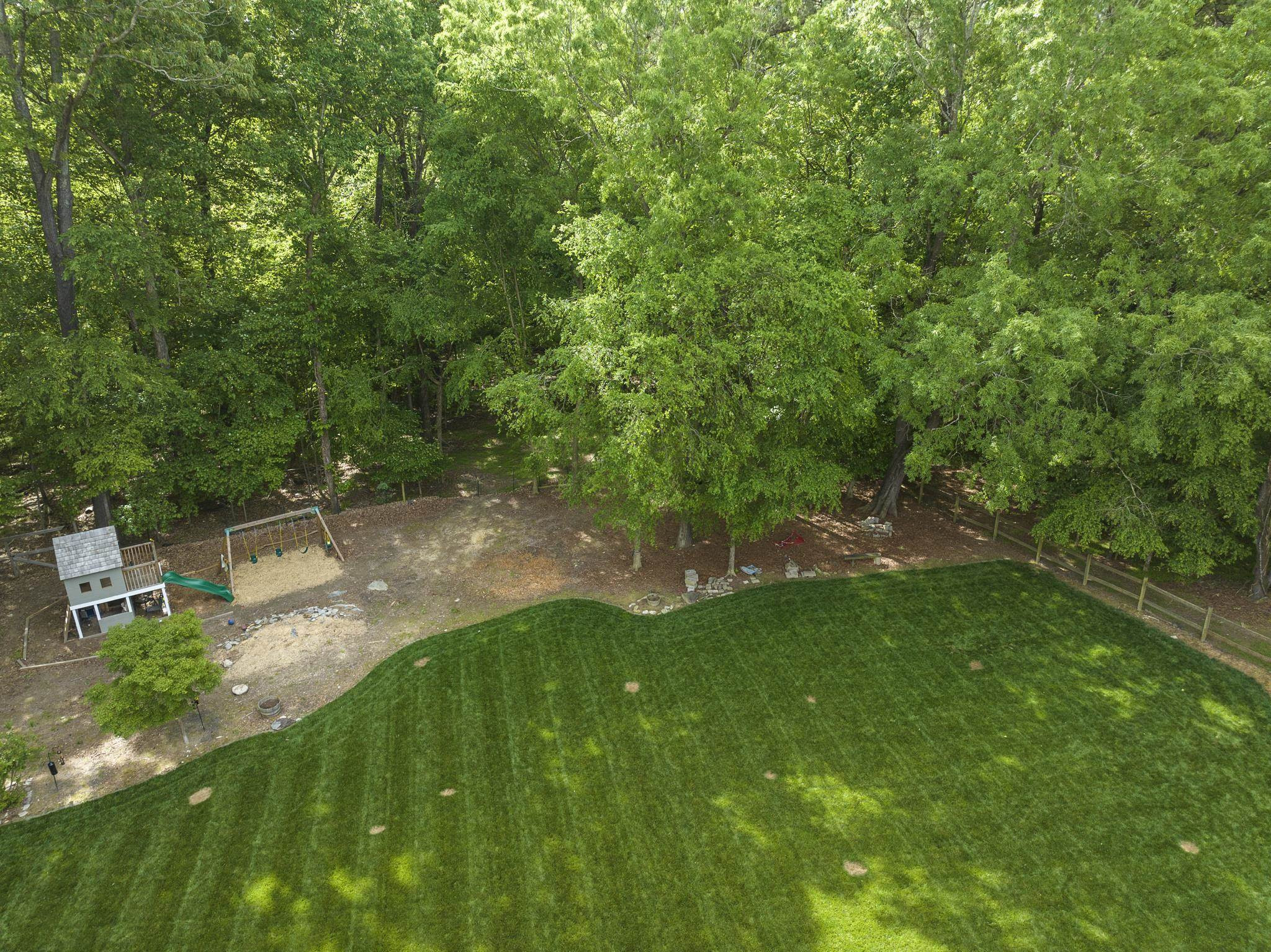 15 Otters Run Durham, NC 27712 - Photo 41 of 46 a backyard of a house with lots of green space