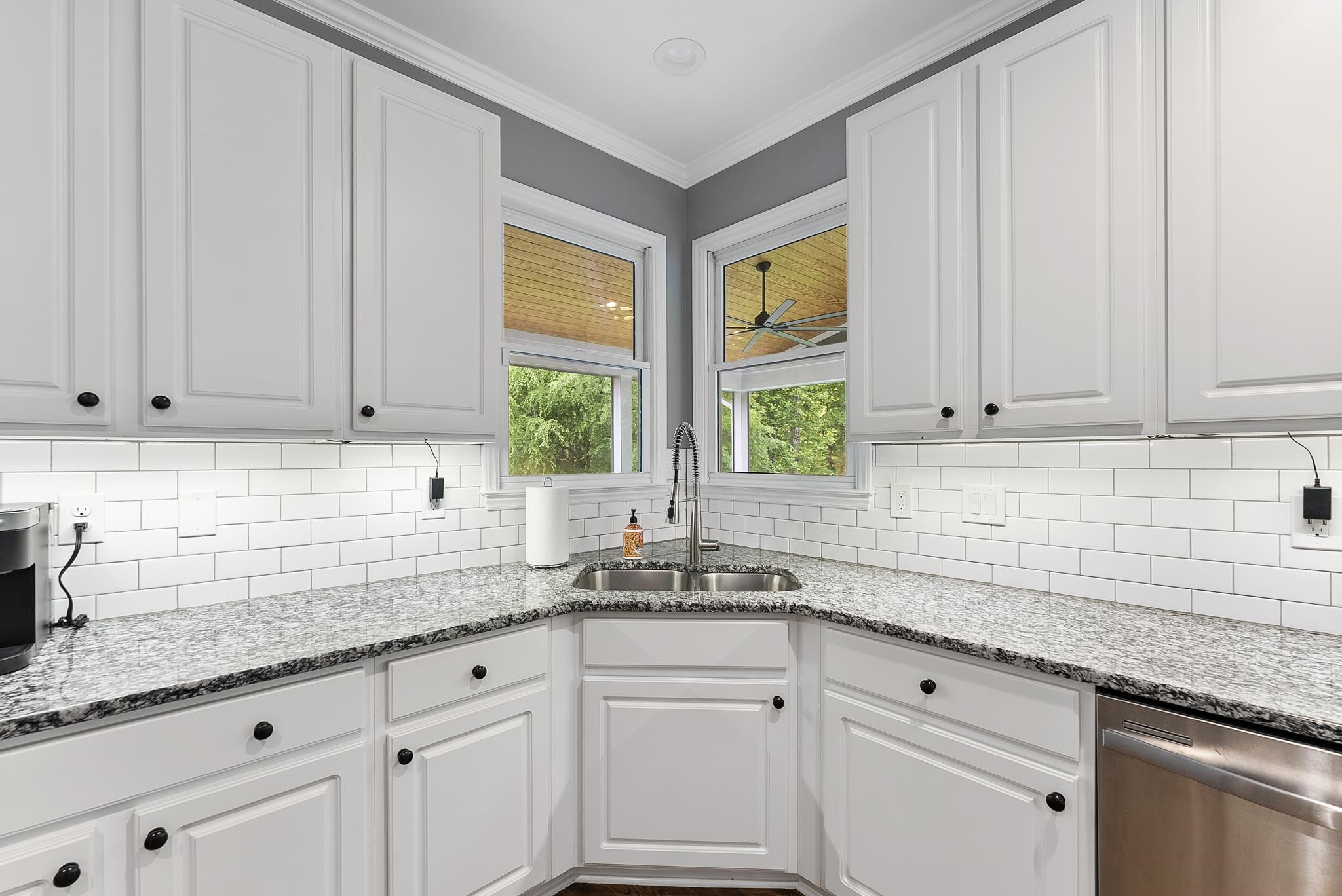 15 Otters Run Durham, NC 27712 - Photo 9 of 46 a kitchen with granite countertop white cabinets and white stainless steel appliances with a window