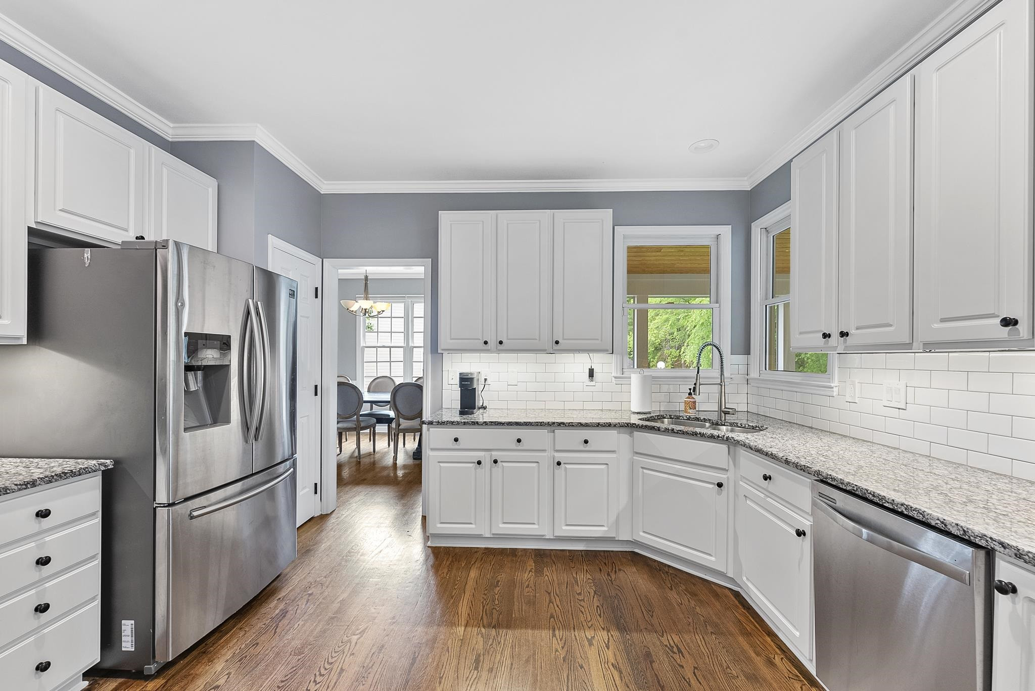 15 Otters Run Durham, NC 27712 - Photo 10 of 46 a kitchen with granite countertop appliances cabinets and a sink
