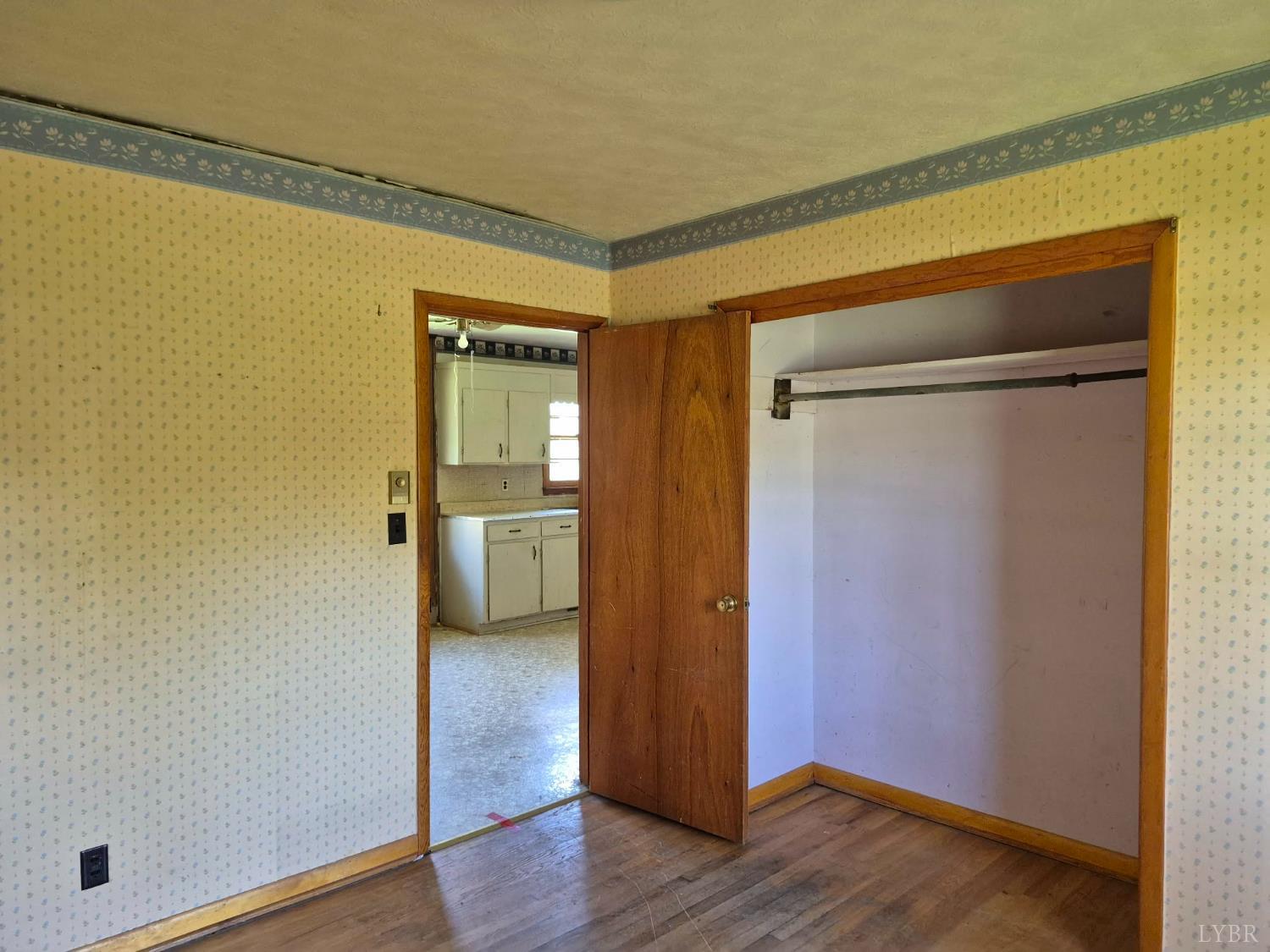 1165 Irving Road Thaxton, VA 24174 - Photo 19 of 20 a view of a hallway with wooden floor