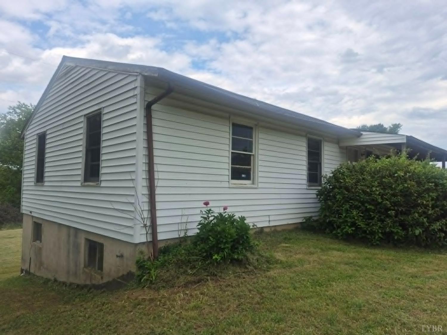 1165 Irving Road Thaxton, VA 24174 - Photo 2 of 20 a view of a house with a yard