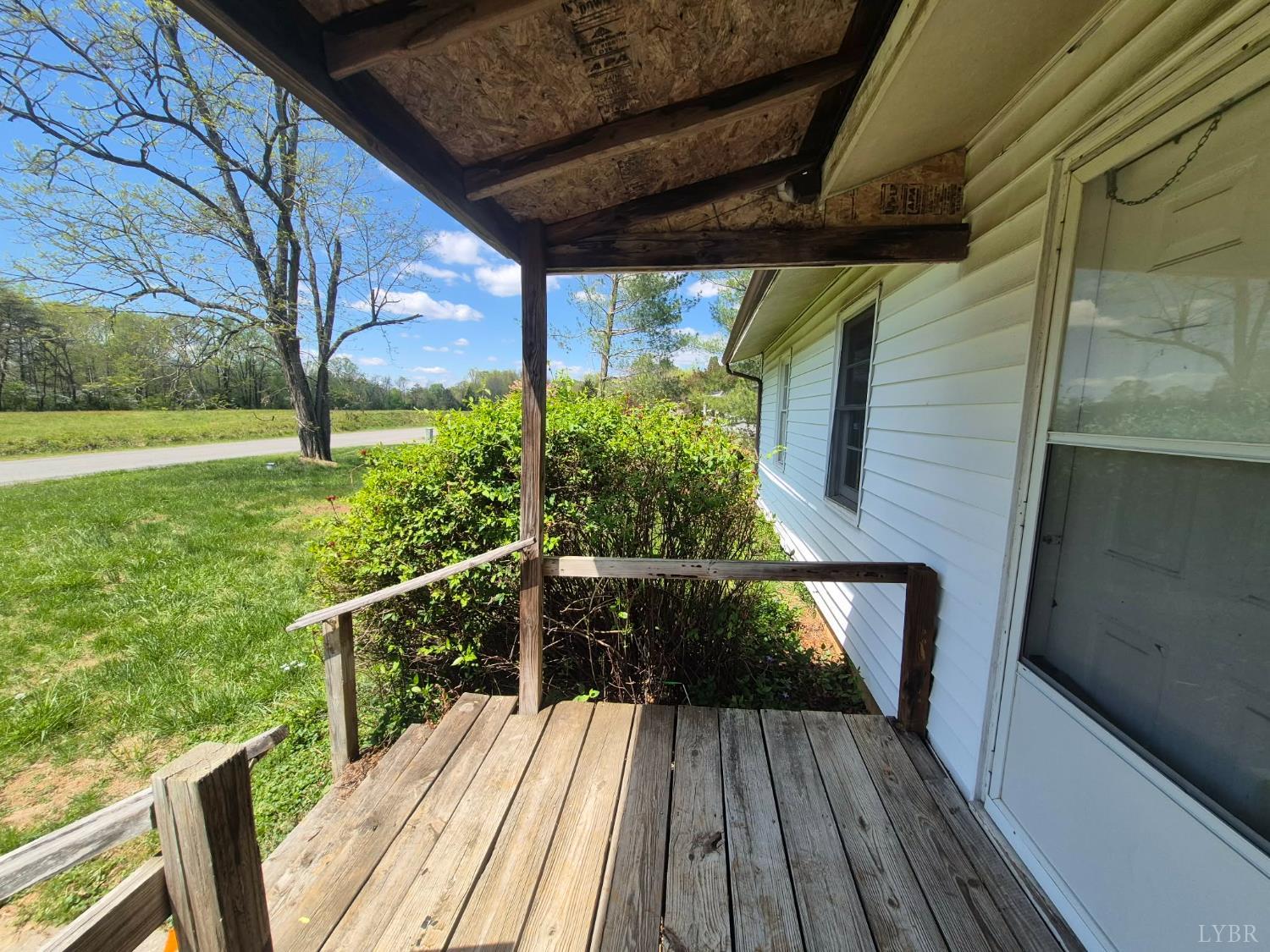 1165 Irving Road Thaxton, VA 24174 - Photo 10 of 20 a view of deck with furniture and garden