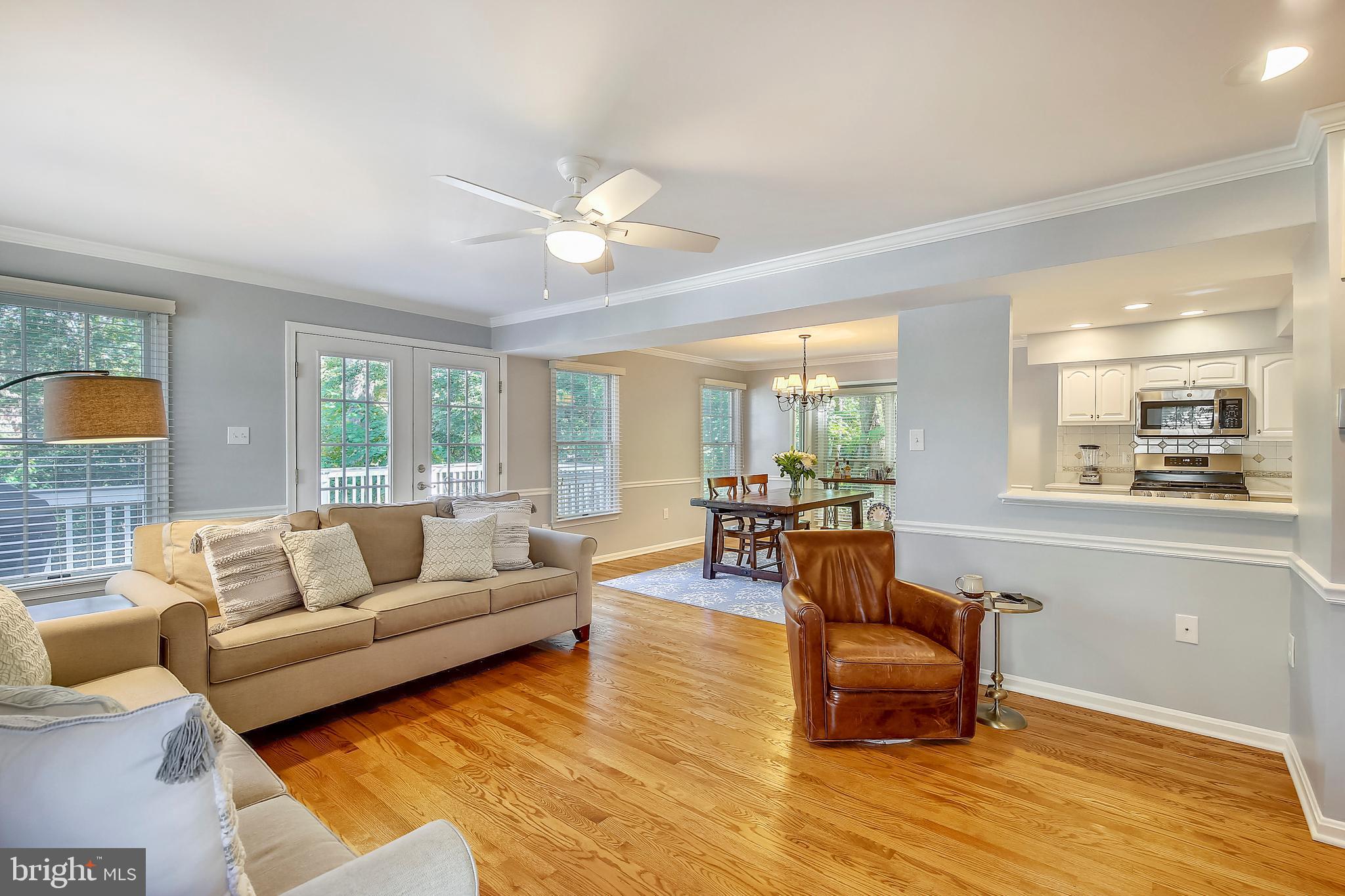 9929 Woodburn Road Silver Spring, MD 20901 - Photo 12 of 33 Family Room/Dining Room opens to deck