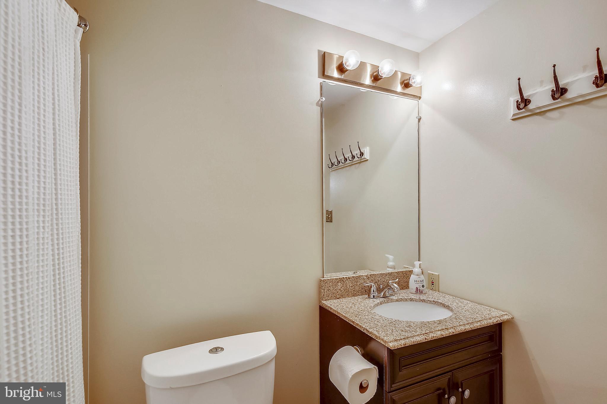 9929 Woodburn Road Silver Spring, MD 20901 - Photo 27 of 33 Full bath attached to Basement bedroom space