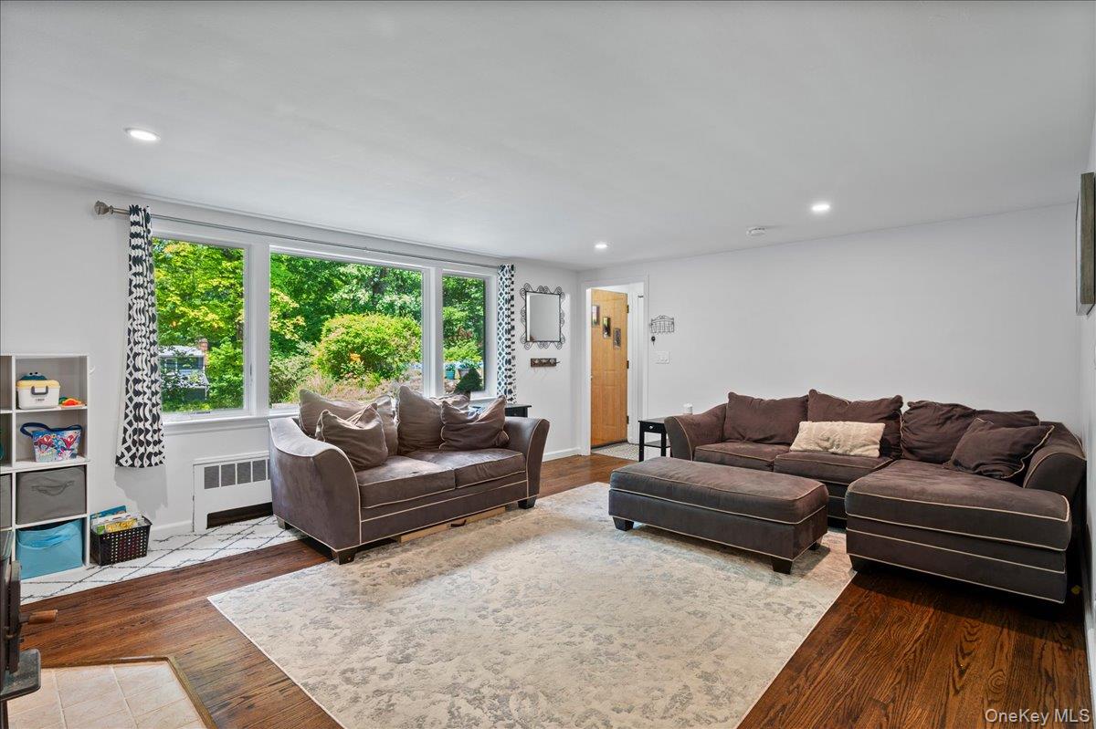 105 High St Extension Mount Kisco, NY 10549 - Photo 13 of 38 a living room with furniture and a large window
