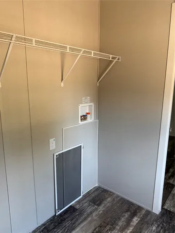 a view of small space with racks on the wall