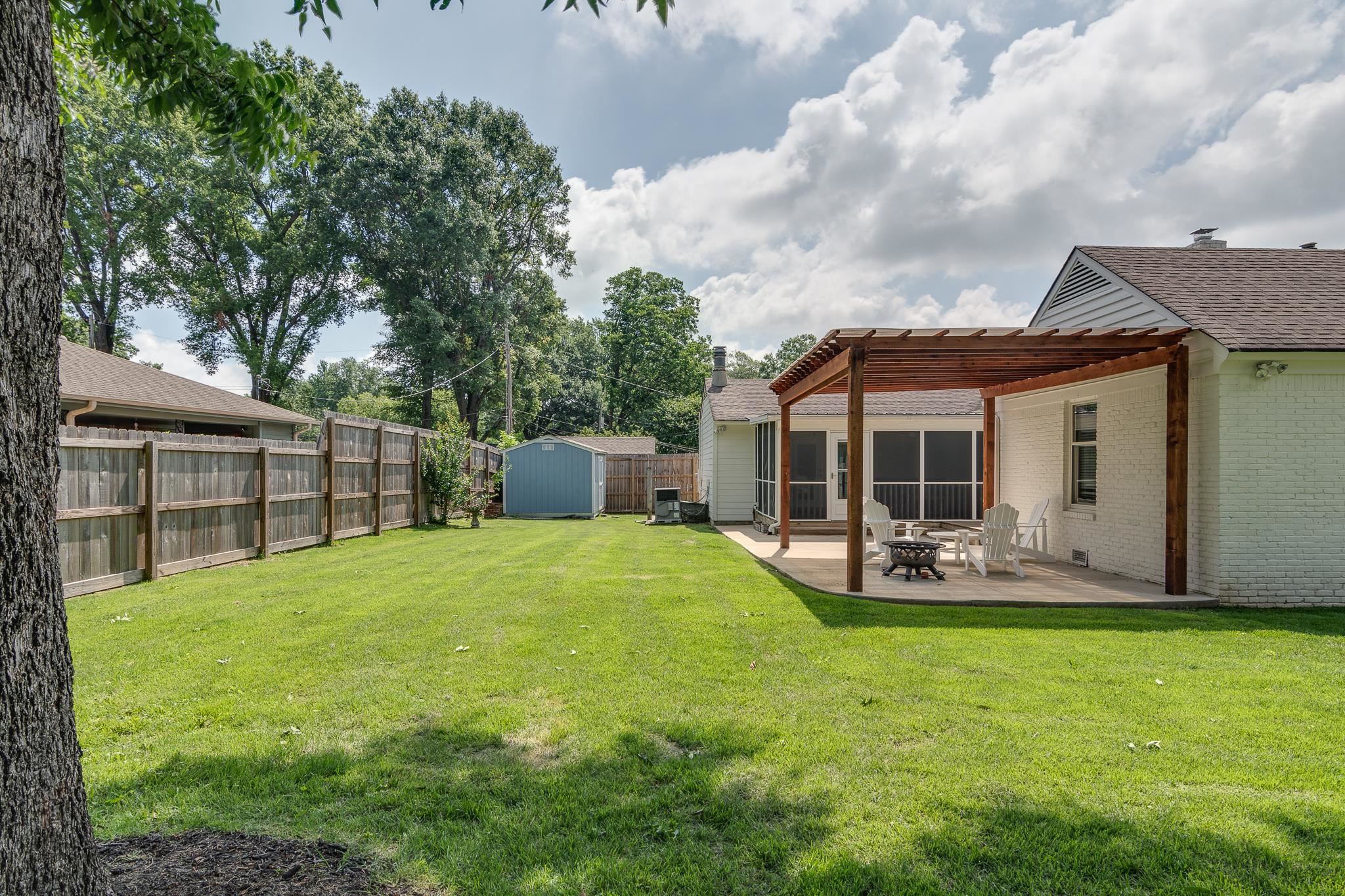 4978 Chickasaw Road Memphis, TN 38117 - Photo 28 of 28 a view of a house with backyard and porch