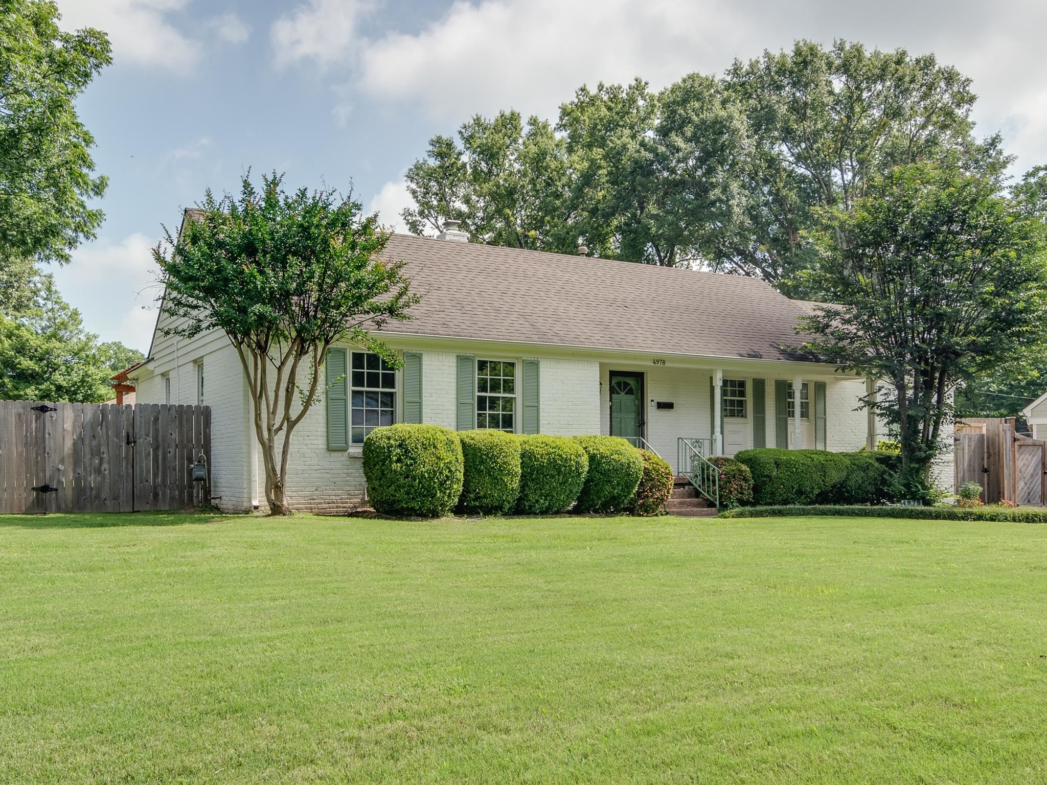 4978 Chickasaw Road Memphis, TN 38117 - Photo 3 of 28 a front view of house with yard and green space