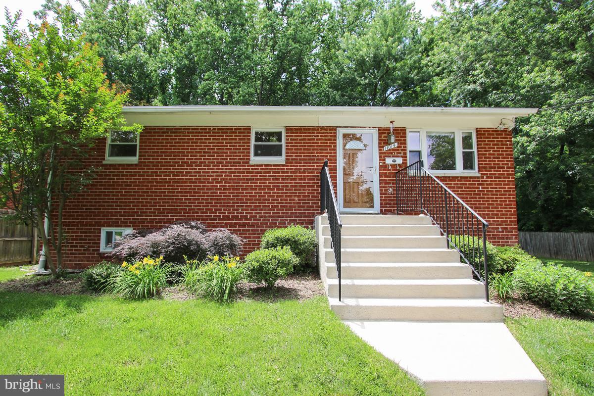Beautiful landscaped yard.  Brick front.