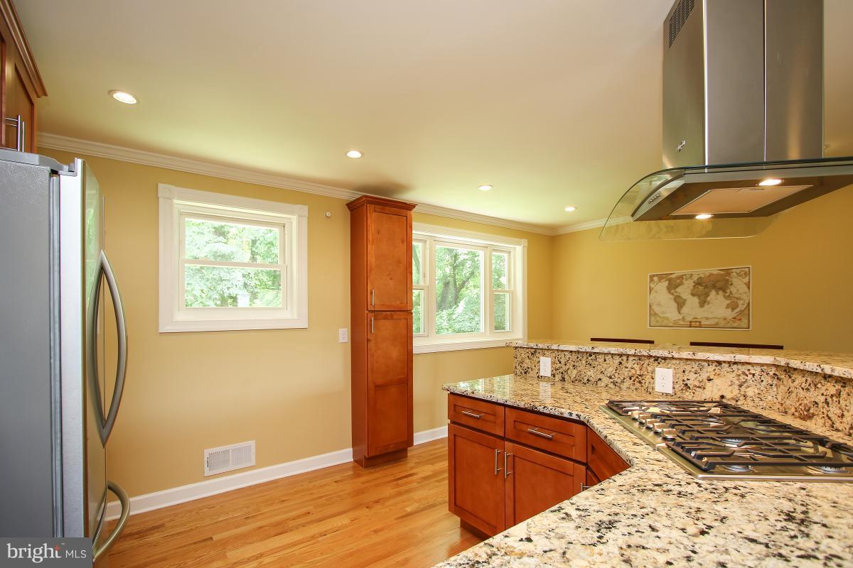 11014 Troy Road Rockville, MD 20852 - Photo 13 of 30 Granite counters. Gas cooktop. Pantry.
