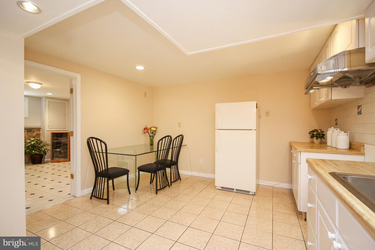 11014 Troy Road Rockville, MD 20852 - Photo 22 of 30 Lower level dining area.