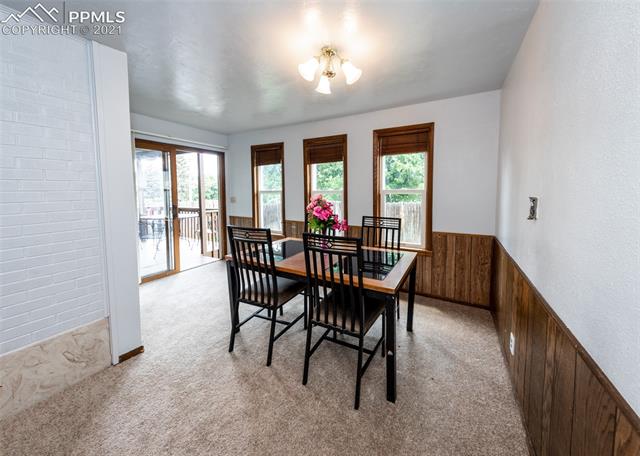 2208 North Chelton Road Colorado Springs, CO 80909 - Photo 8 of 24 This dining space also has walk-out access