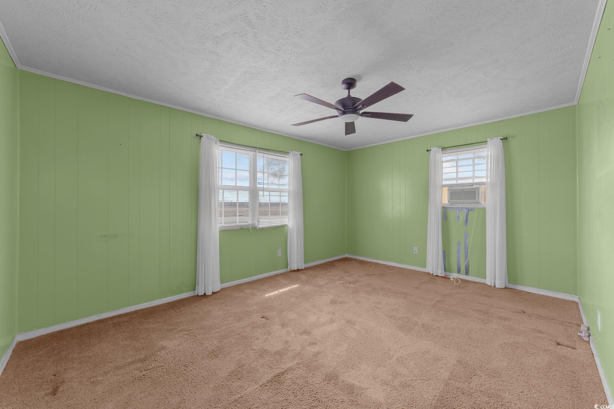 2710 Gaddys Mill Road Dillon, SC 29536 - Photo 18 of 40 Spare room featuring baseboards, carpet floors, a