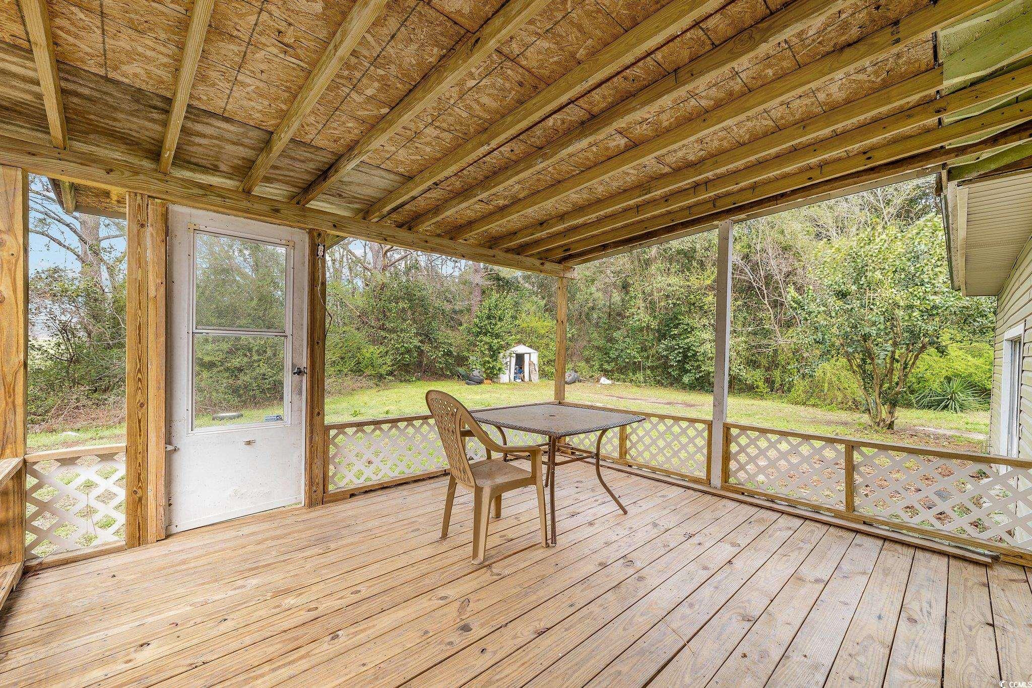2710 Gaddys Mill Road Dillon, SC 29536 - Photo 25 of 40 View of unfurnished sunroom