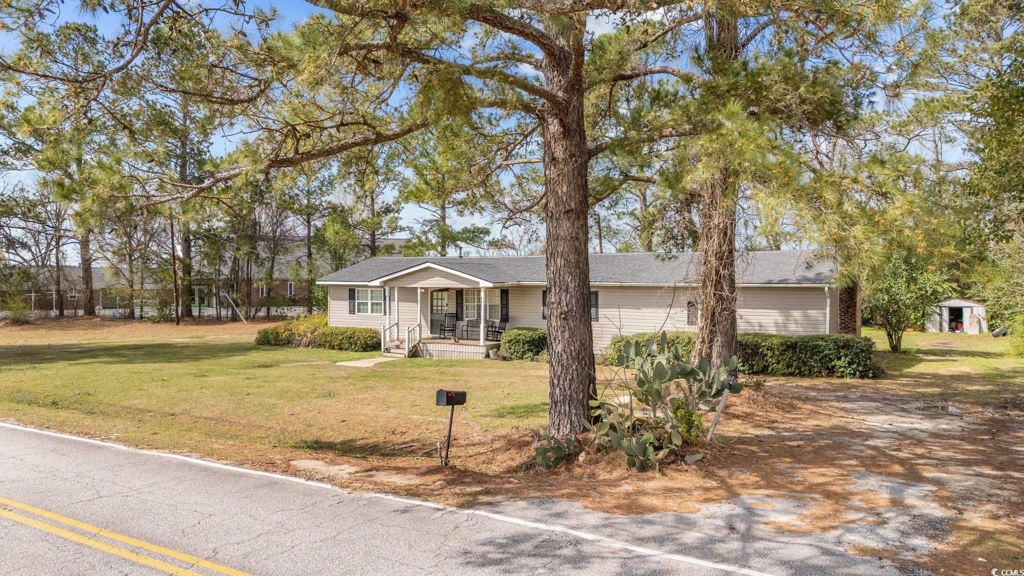 2710 Gaddys Mill Road Dillon, SC 29536 - Photo 38 of 40 Single story home with a front yard and a shingled