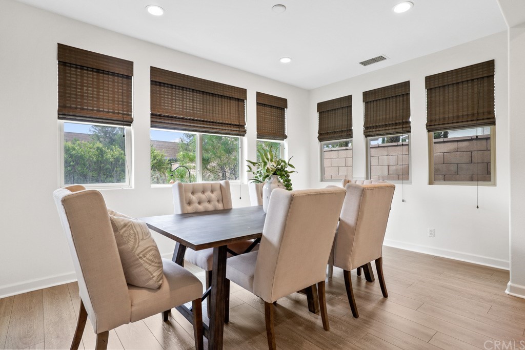 279 Barnes Road Tustin, CA 92782 - Photo 12 of 32 a view of a dining room with furniture window and outside view