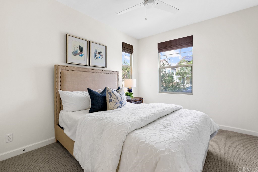 279 Barnes Road Tustin, CA 92782 - Photo 16 of 32 a large bed sitting in a bedroom next to a window