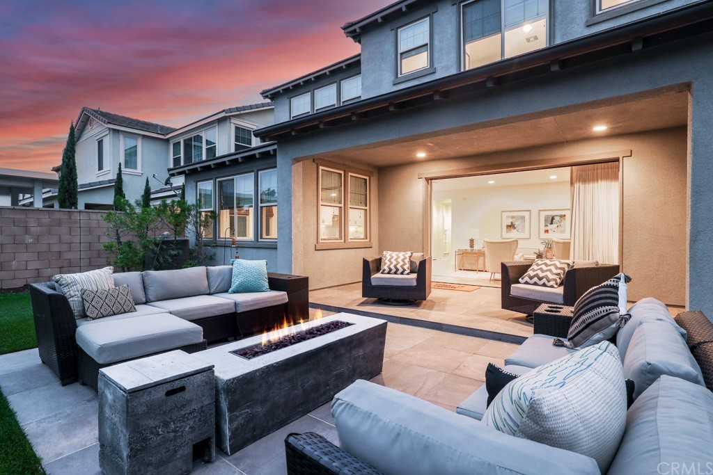 279 Barnes Road Tustin, CA 92782 - Photo 31 of 32 a living room with furniture wooden floor and a large window