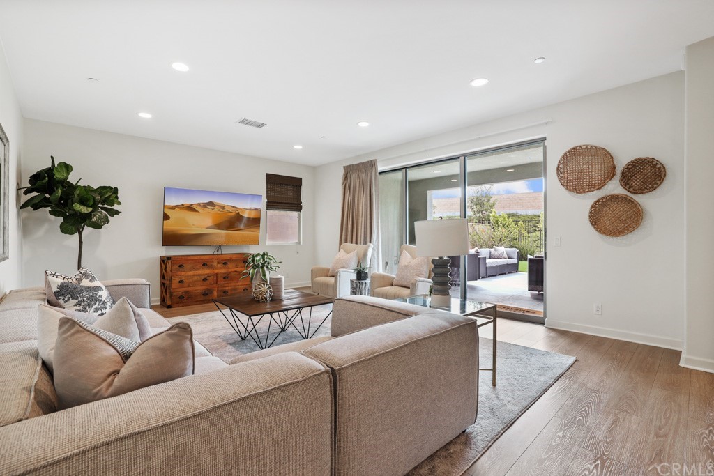 279 Barnes Road Tustin, CA 92782 - Photo 5 of 32 a living room with furniture and a large window