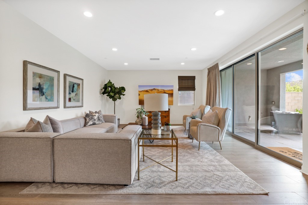279 Barnes Road Tustin, CA 92782 - Photo 6 of 32 a living room with furniture and wooden floor