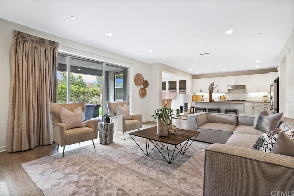 279 Barnes Road Tustin, CA 92782 - Photo 8 of 32 a living room with furniture and a large window