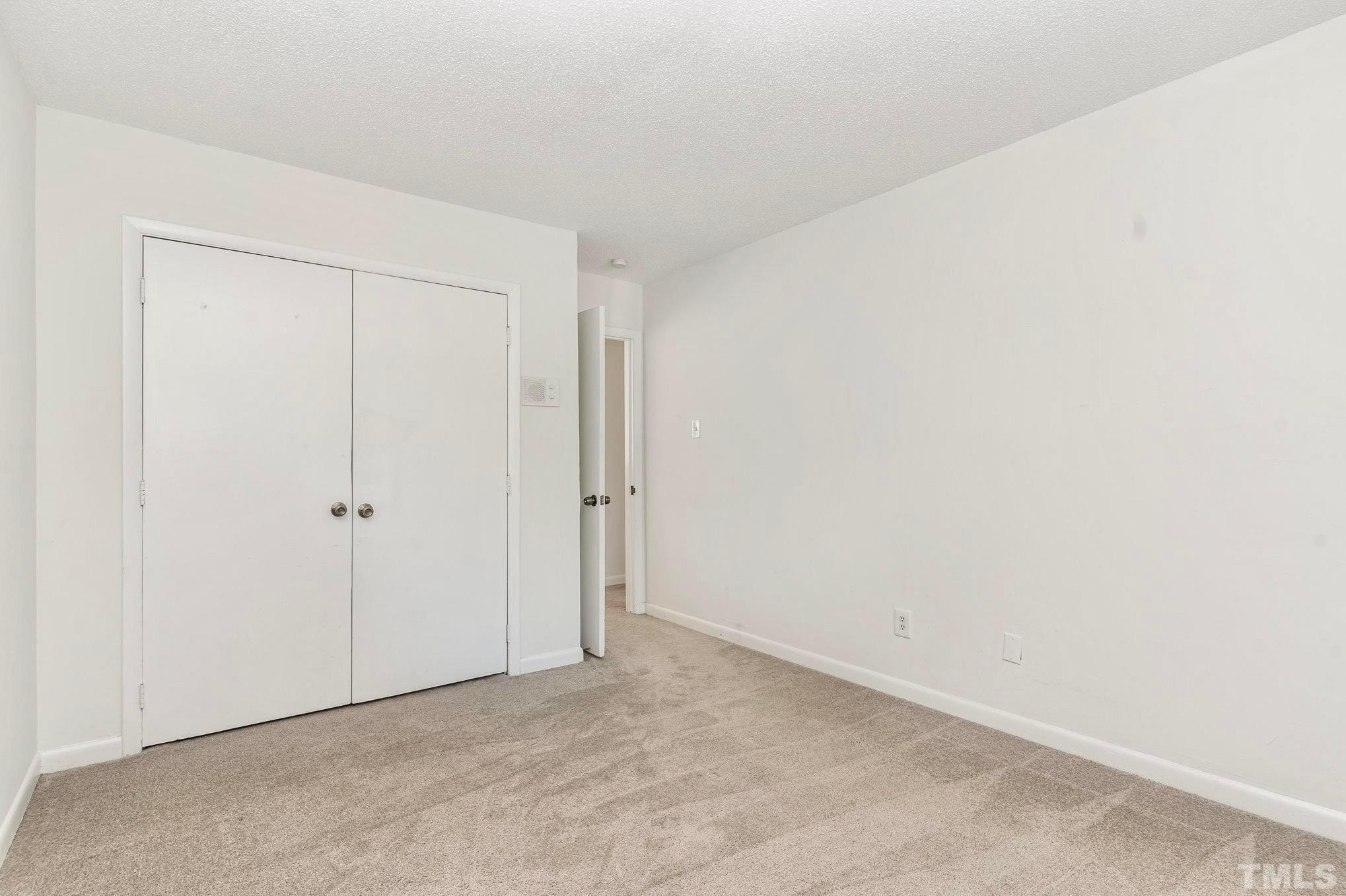 5073 Tall Pines Court Raleigh, NC 27609 - Photo 14 of 21 a view of an empty room